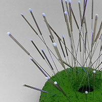 Brooch “Social distancing, green“ – felted wool, luminous paint, acupuncture needles, steel