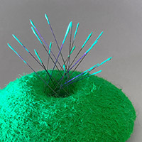 Brooch “Social distancing, green“ – felted wool, luminous paint, acupuncture needles, steel